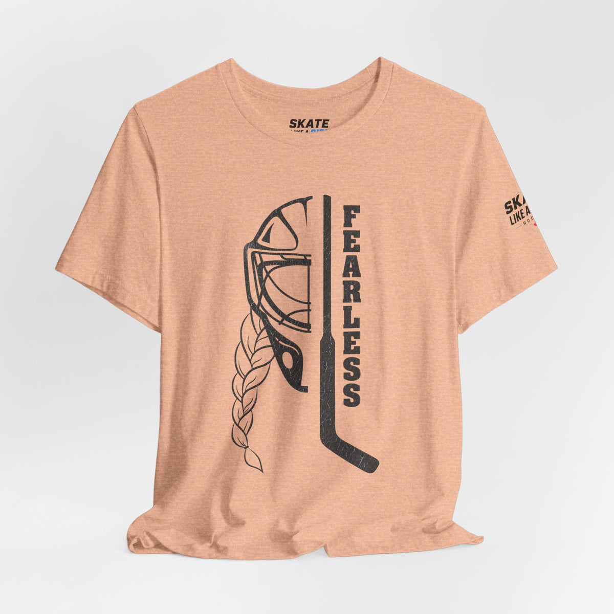 Skate Like A Girl Fearless Goalie hockey tee in Heather Peach - styled