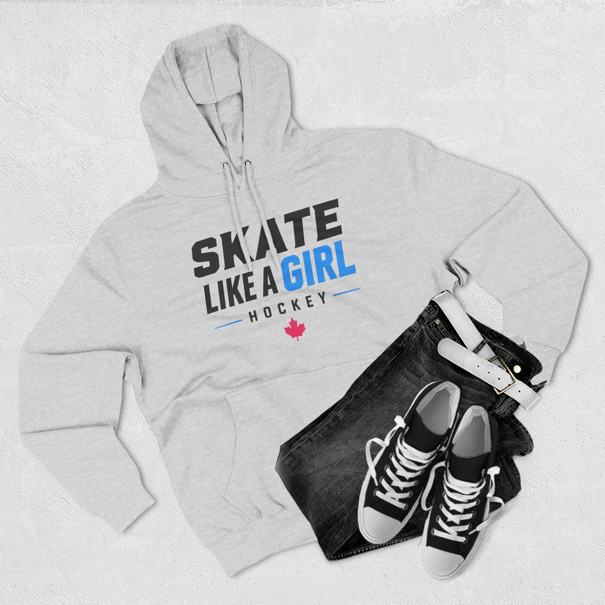Skate Like A Girl Hockey hoodie in Heather Grey styled with jeans and sneakers