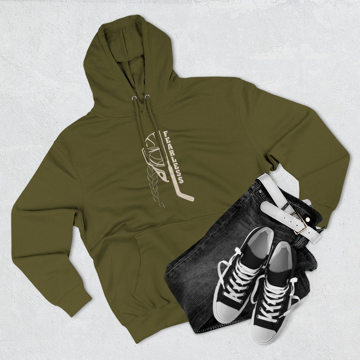Fearless goalie hockey hoodie in Army Green - styled flat lay with jeans