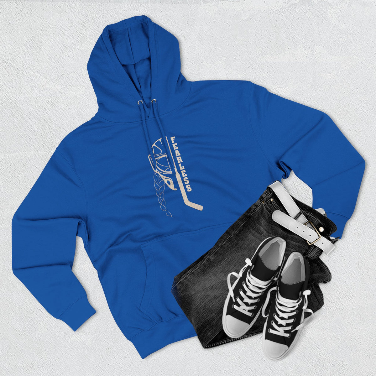 Fearless goalie hockey hoodie in Royal Blue - styled flat lay with jeans