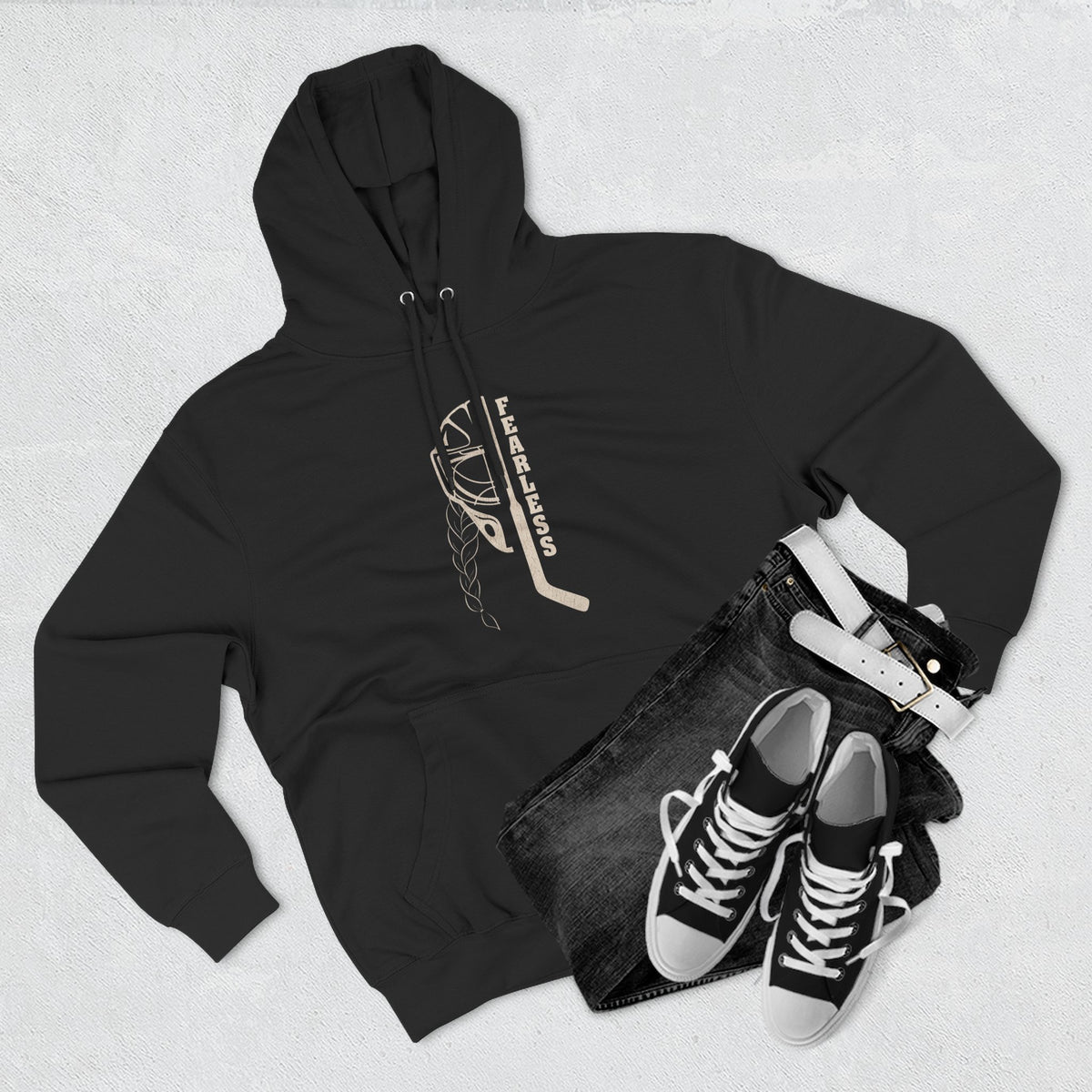 Fearless goalie hockey hoodie in Charcoal Heather - styled flat lay with jeans