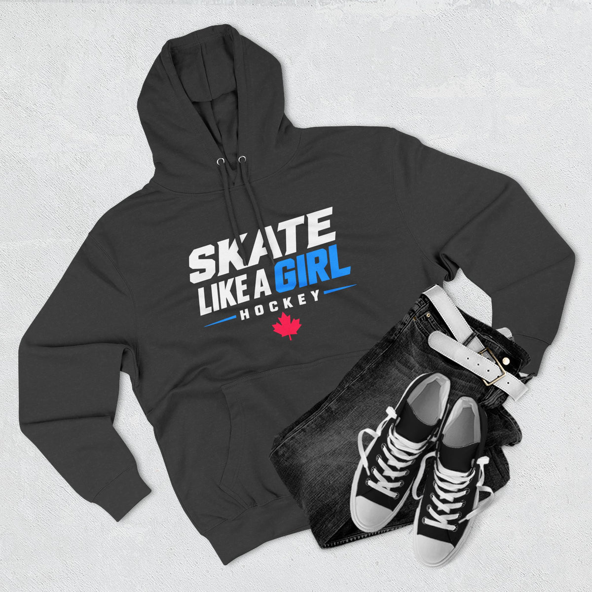 Skate Like A Girl Hockey hoodie in Charcoal Heather styled with jeans and sneakers