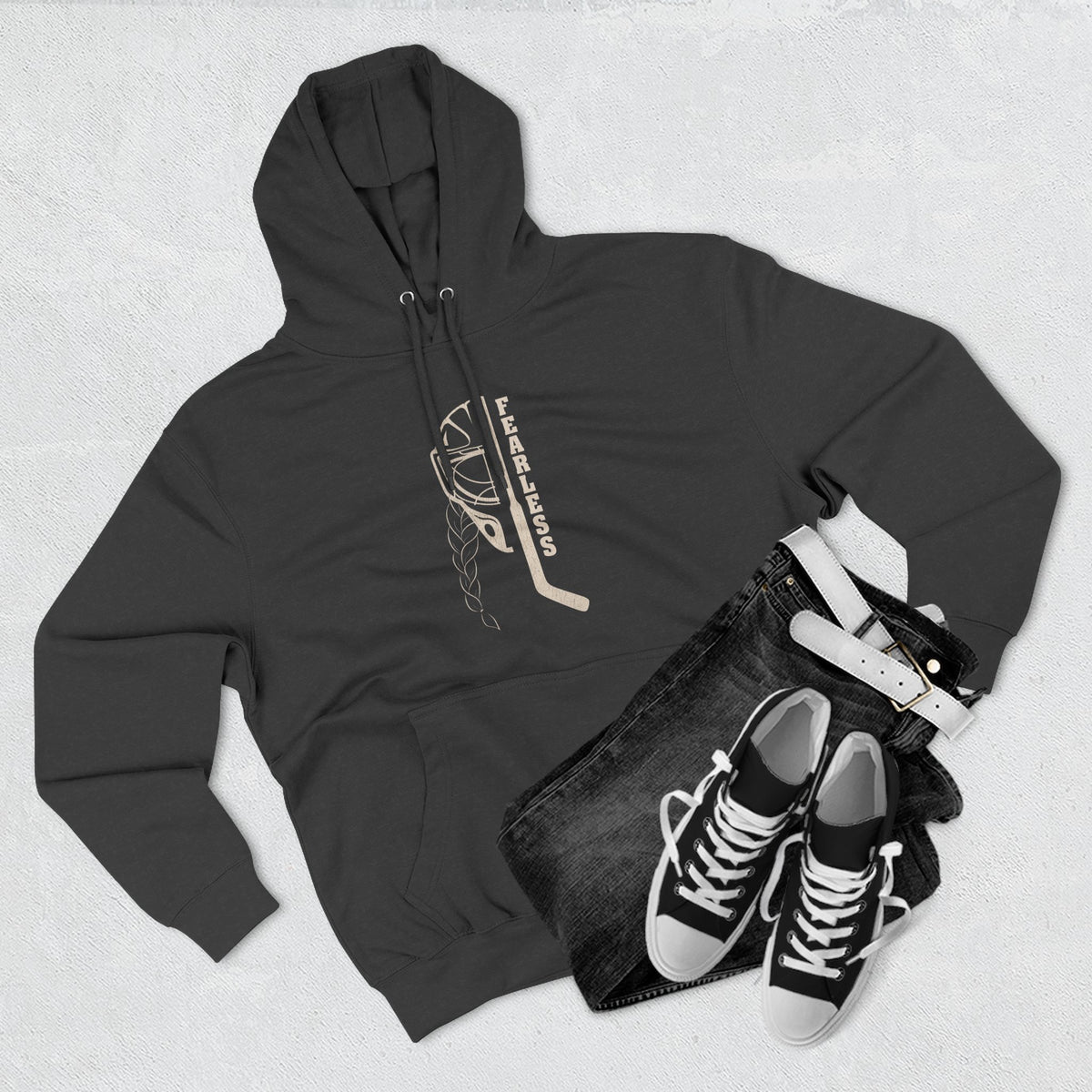 Fearless goalie hockey hoodie in Black - styled flat lay with jeans